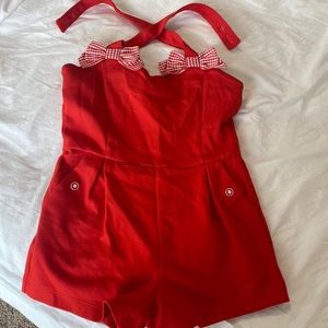 Red romper with bows